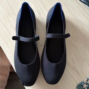 Rothy's Black Flats with Blue Trim
